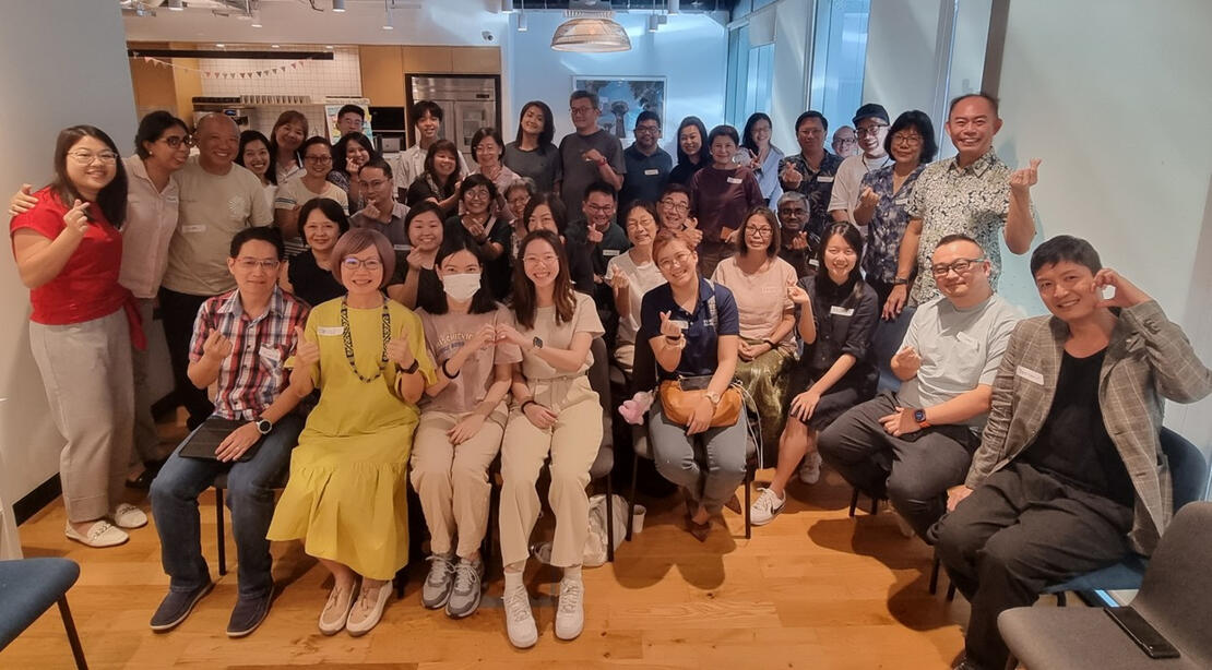 Pease Logo PEASE Café gathering where professionals explore personal growth, health, finance, and volunteering, engaging with experts and a like-minded community.